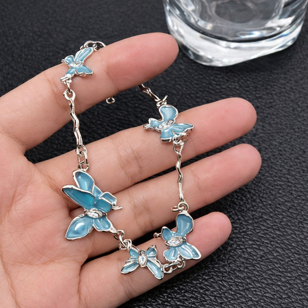Delicate Blue Butterfly Charm Bracelet — a graceful and feminine jewelry piece designed to add elegance, color, and charm to your everyday style.