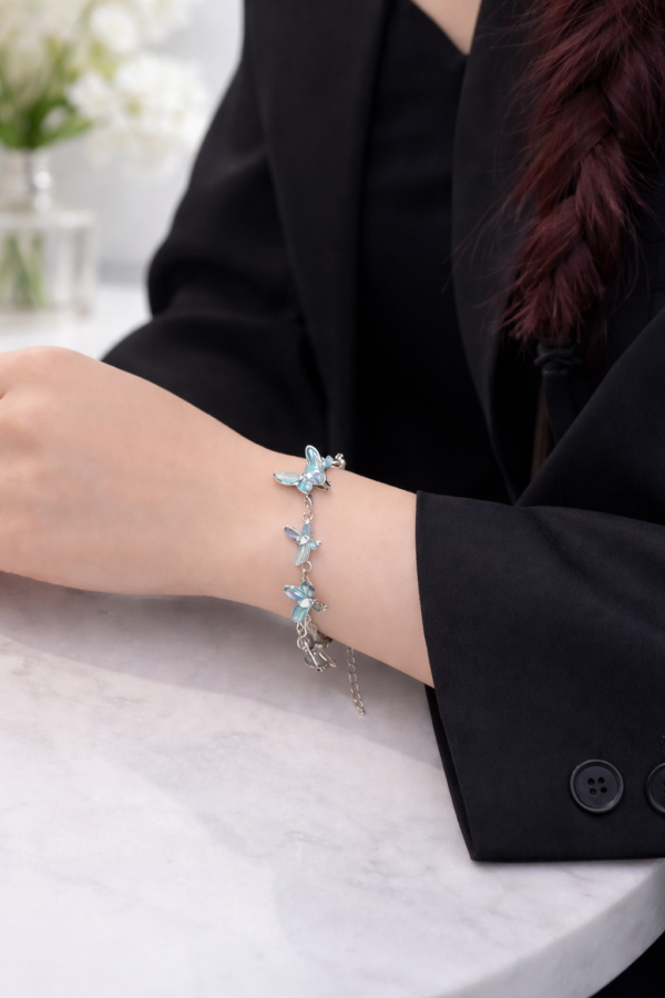 Delicate Blue Butterfly Charm Bracelet — a graceful and feminine jewelry piece designed to add elegance, color, and charm to your everyday style.