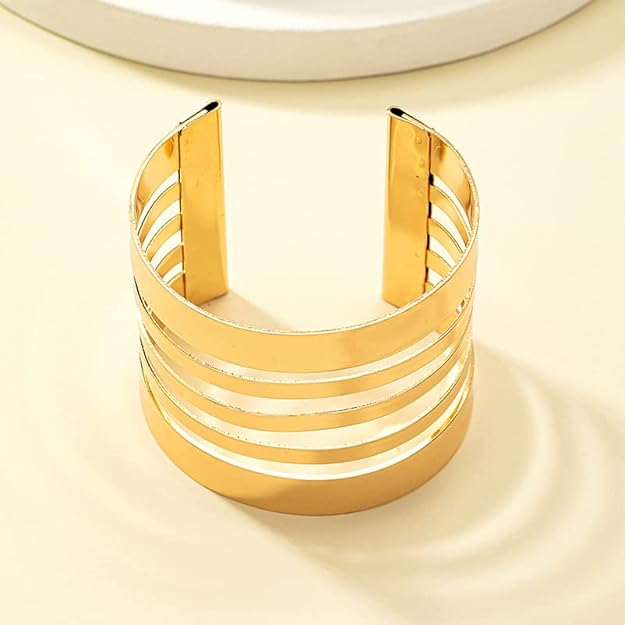 Elegant Gold-Tone Multi-Layer Cuff Bracelet — a modern statement piece designed to elevate your everyday and party look with timeless sophistication. Perfect for women who love minimalist luxury jewelry.