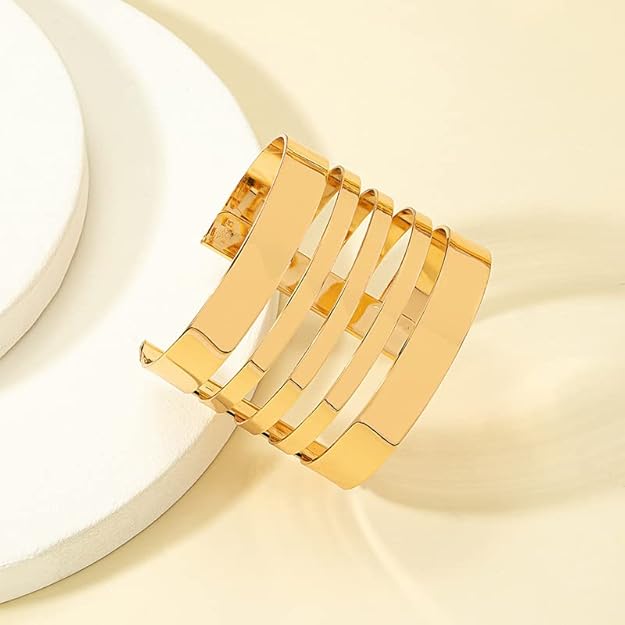 Elegant Gold-Tone Multi-Layer Cuff Bracelet — a modern statement piece designed to elevate your everyday and party look with timeless sophistication. Perfect for women who love minimalist luxury jewelry.